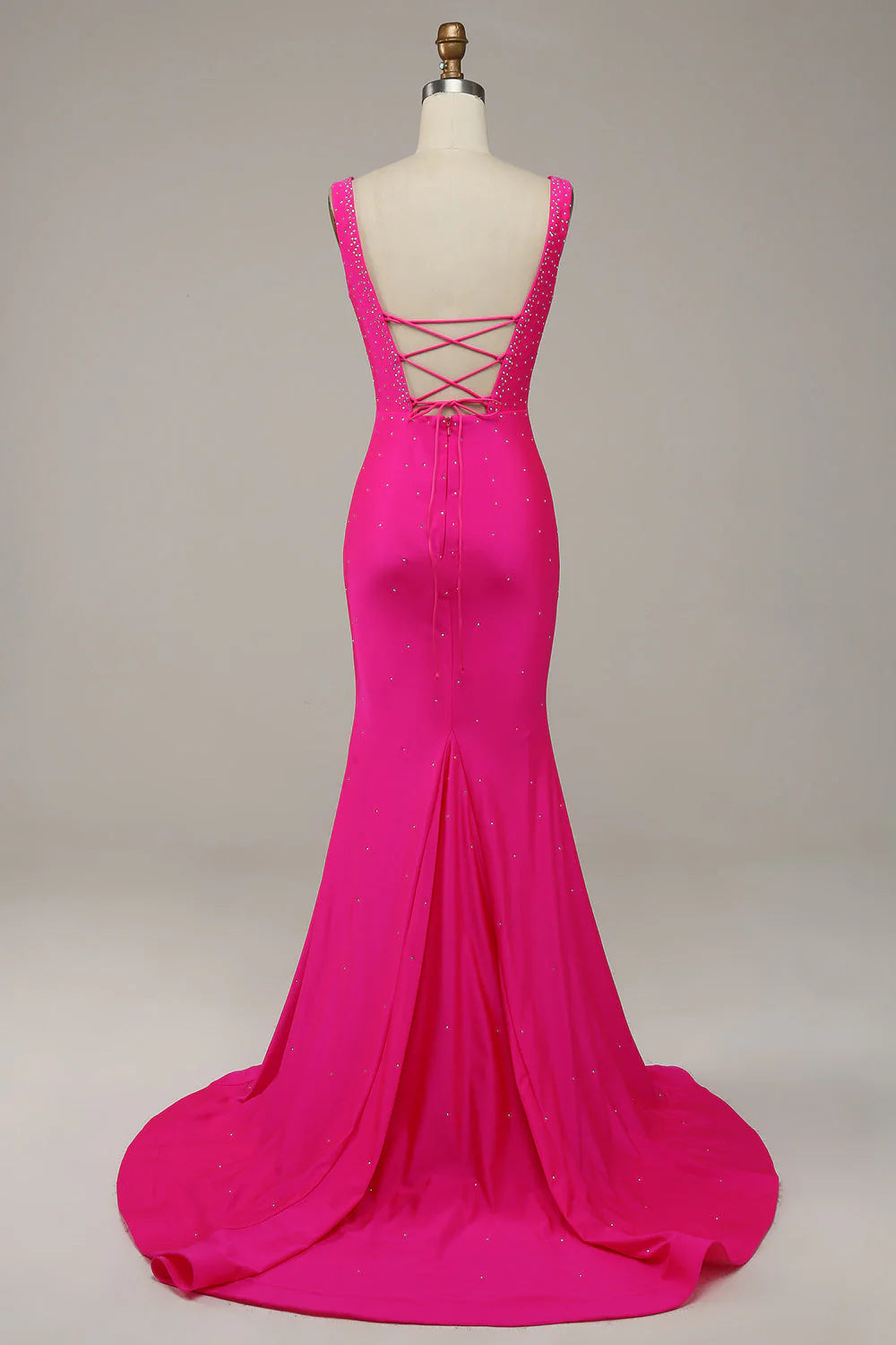 Vestido de fiesta fucsia con cuentas y escote en V de sirena