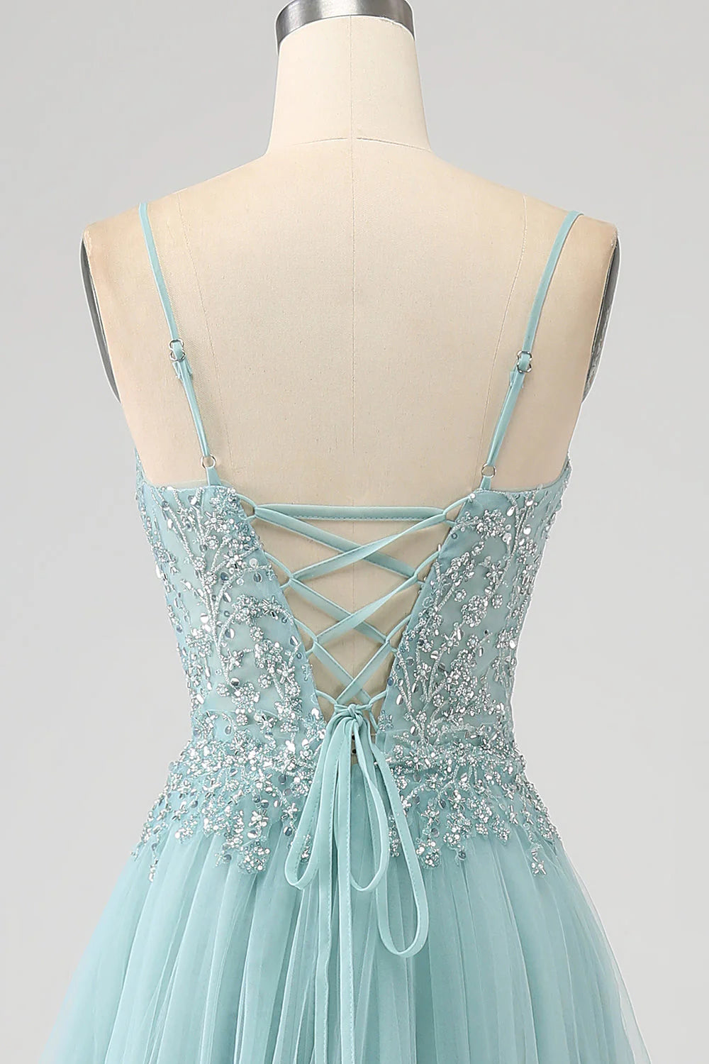 Robe de bal trapèze à paillettes scintillantes et corset avec fente