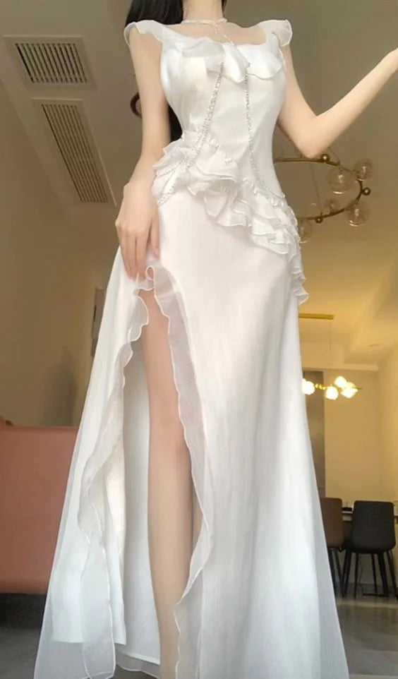 Robe de bal longue et sexy en mousseline blanche avec fente