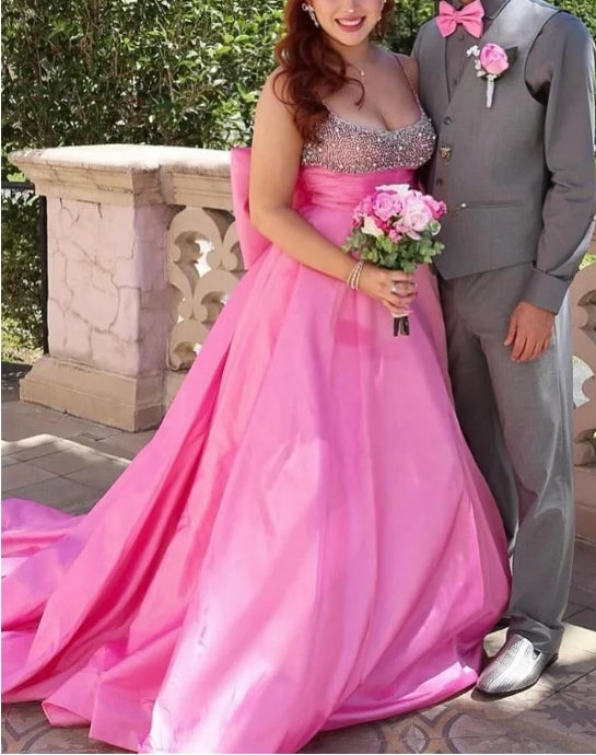 Robe de bal longue trapèze ornée de perles et d'un nœud dans le dos