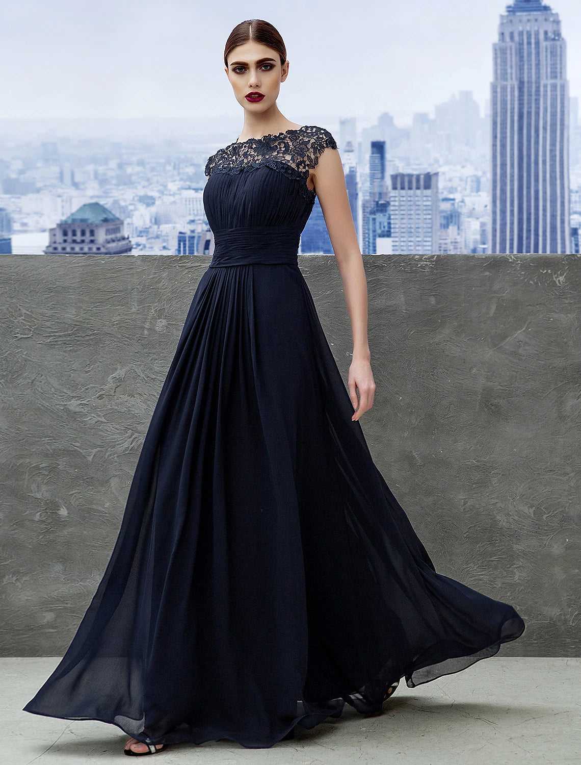 Weitese A-Line Empire Chiffon Gown with boat neck and short sleeves.