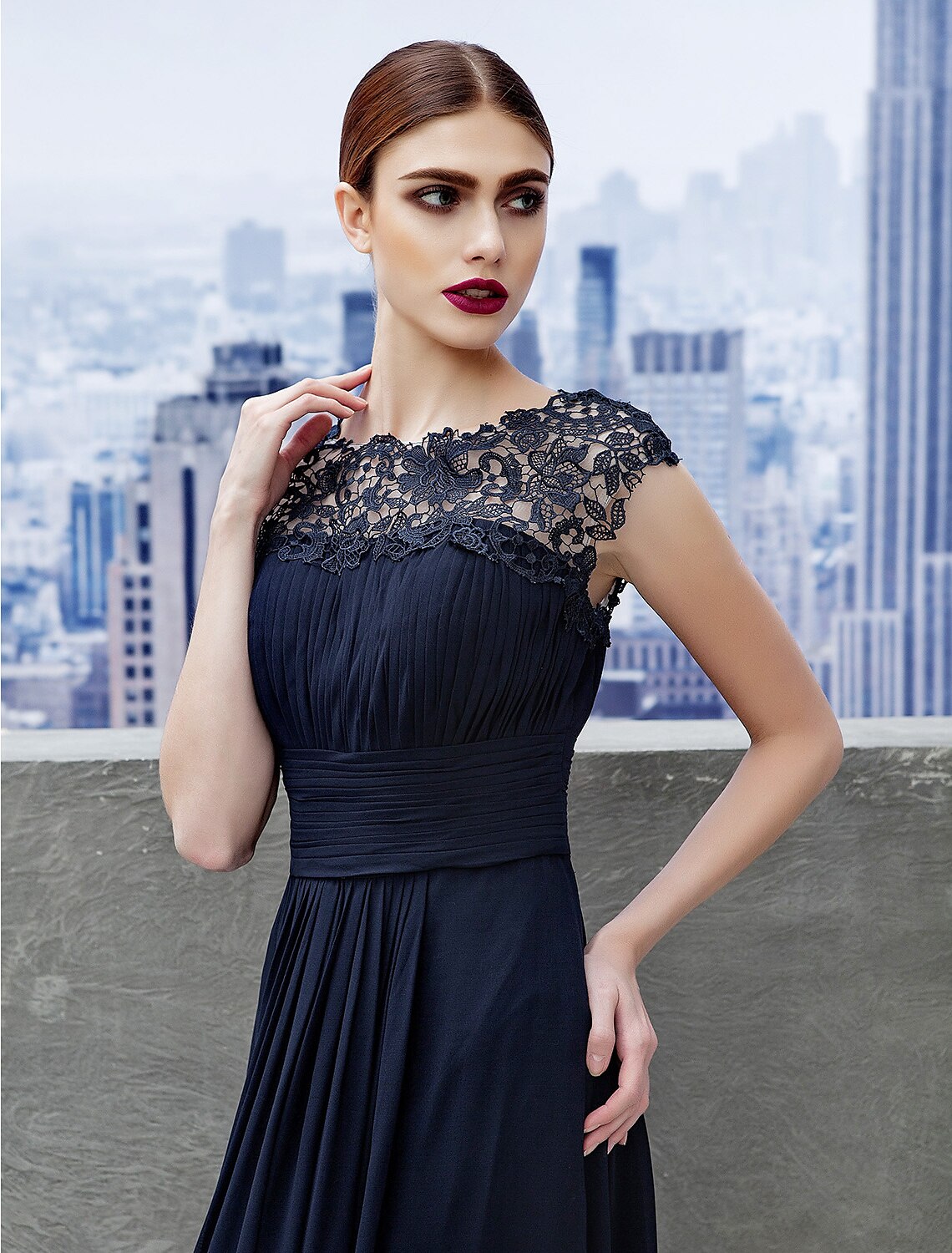 Close-up of ruched lace insert and chiffon fabric on Weitese gown.