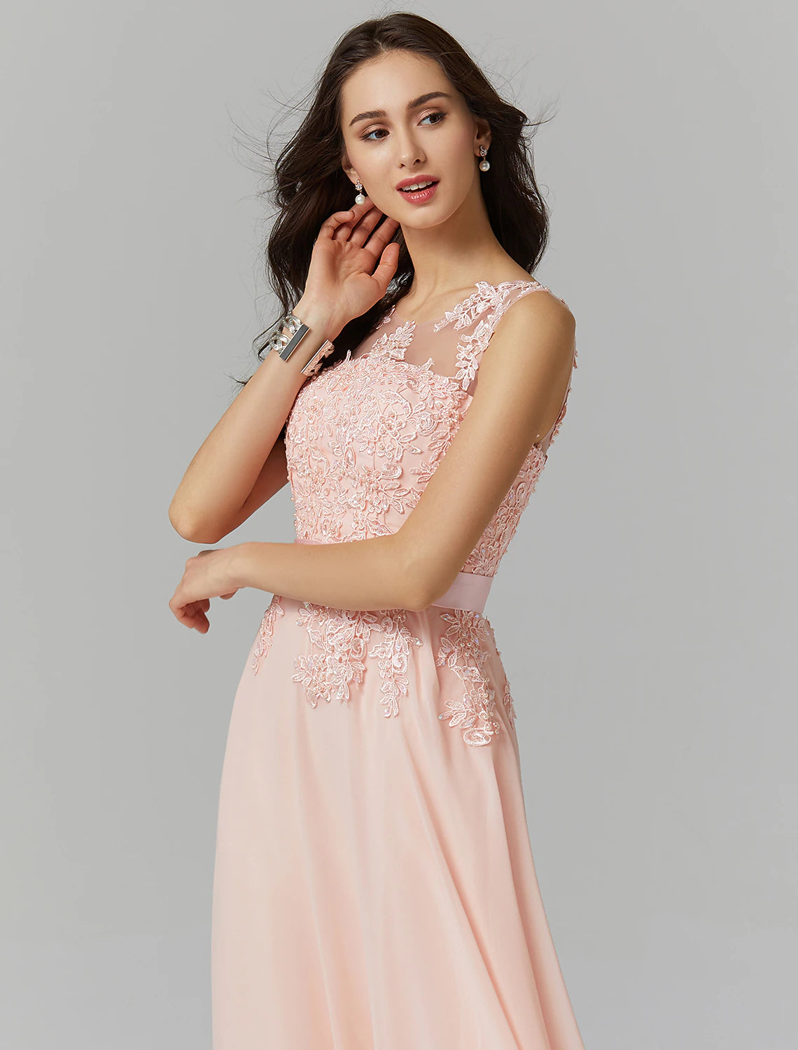 Close-up of appliques on Weitese illusion neck gown.