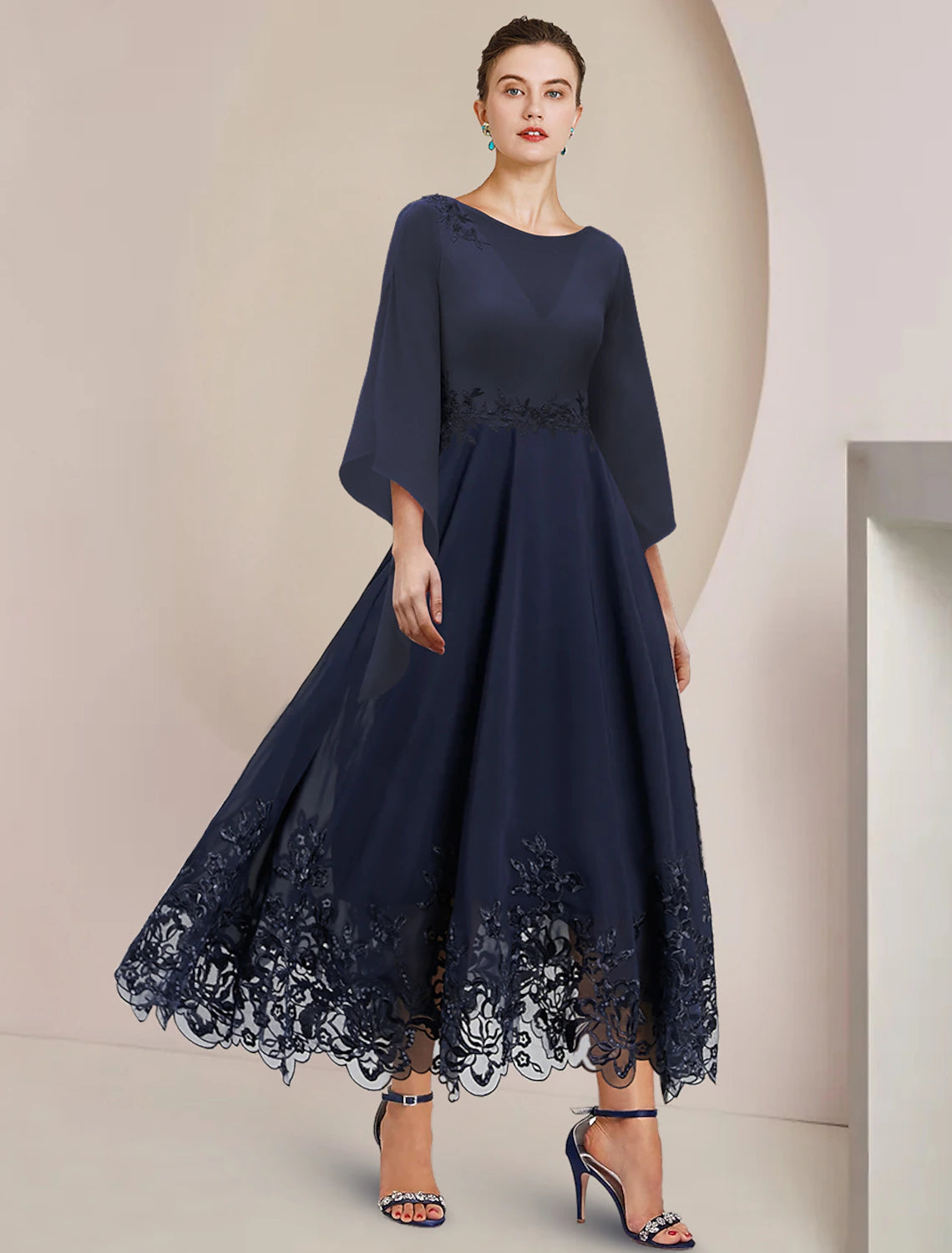 Weitese A-Line tea length dress with scoop neck and 3/4 lace sleeves.