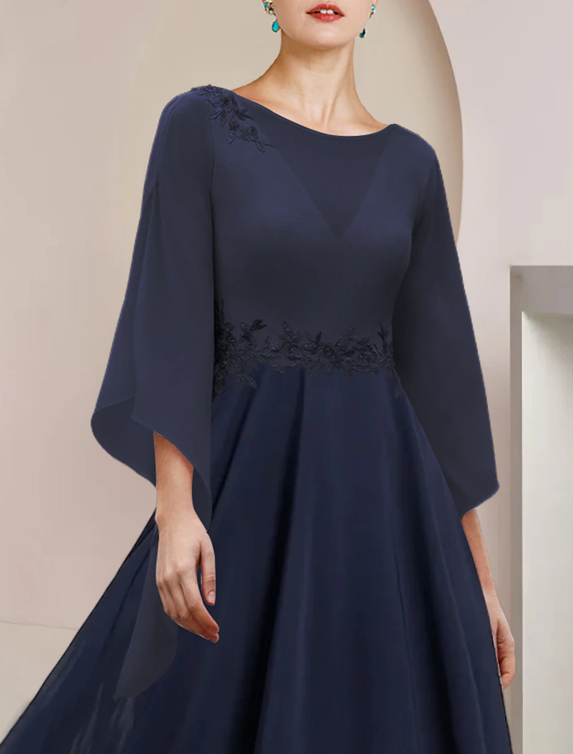 Back view of the Weitese Mother of the Bride dress with applique details.
