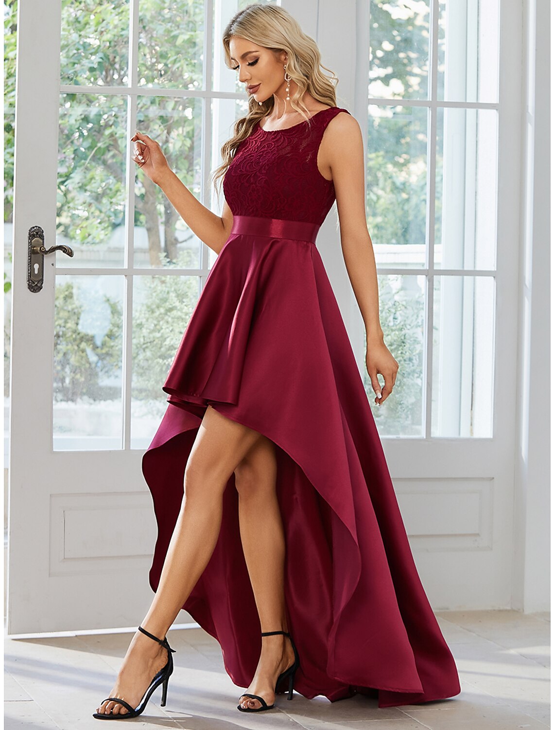 Back view of a woman showcasing the elegant A-line satin dress.