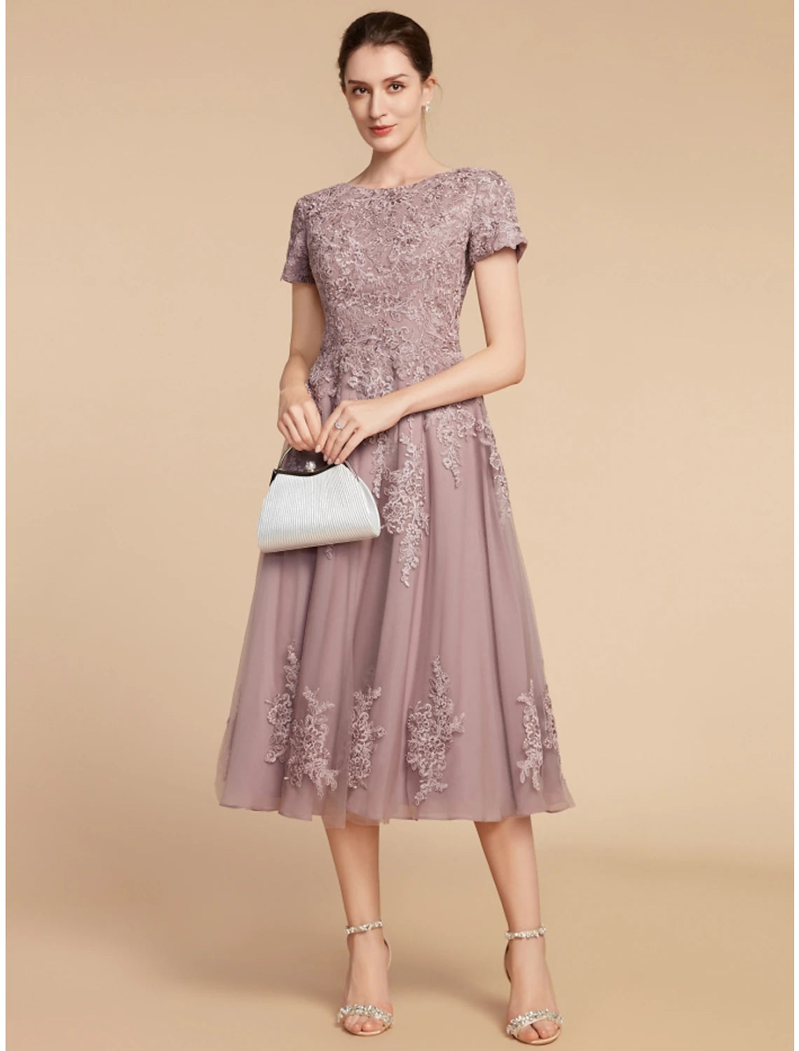 Weitese A-Line tea length dress with jewel neck and short sleeves.