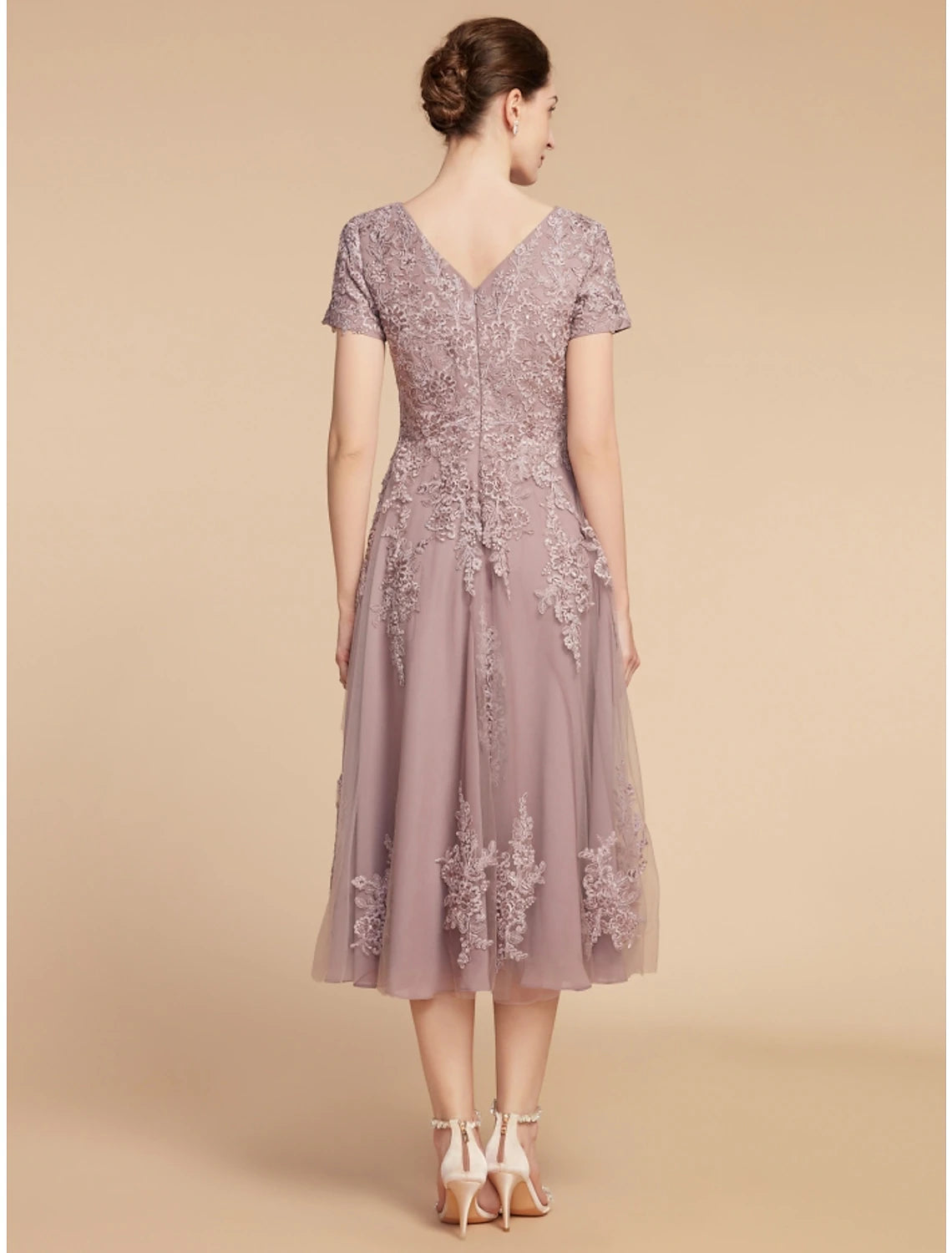 Side view of the elegant A-Line lace tulle dress.