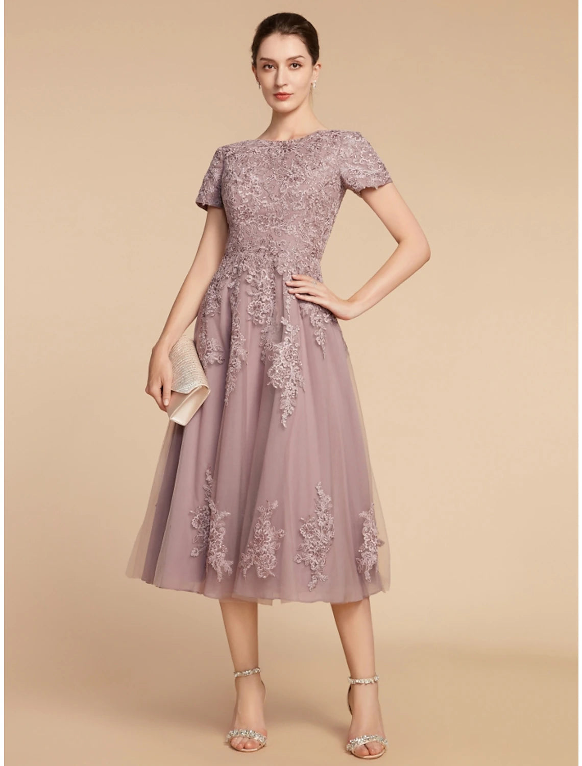 Close-up of lace tulle fabric and ruching on the dress bodice.