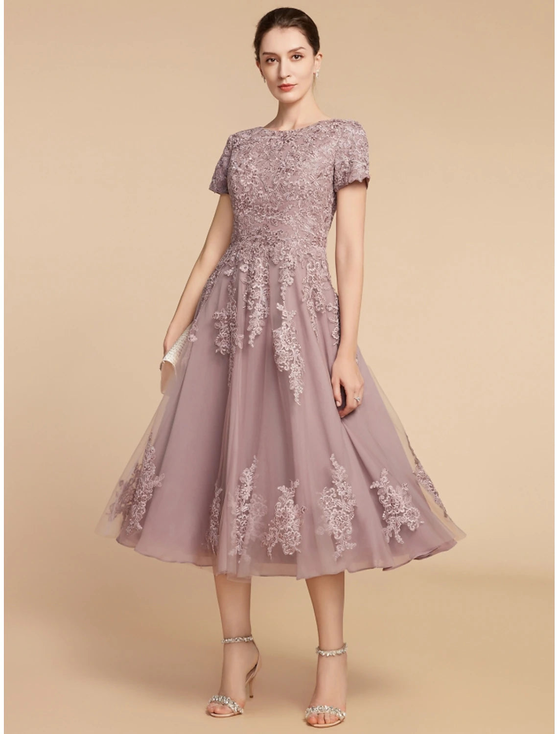 Weitese A-Line dress showing flower detail and short sleeves.