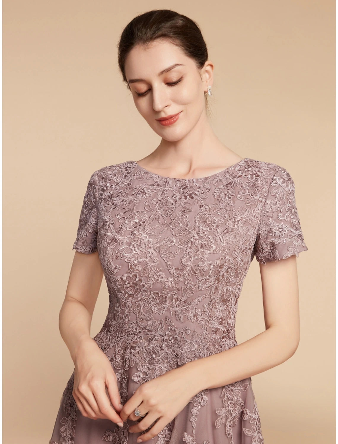 Full length view of the tea length A-Line dress for wedding guests.