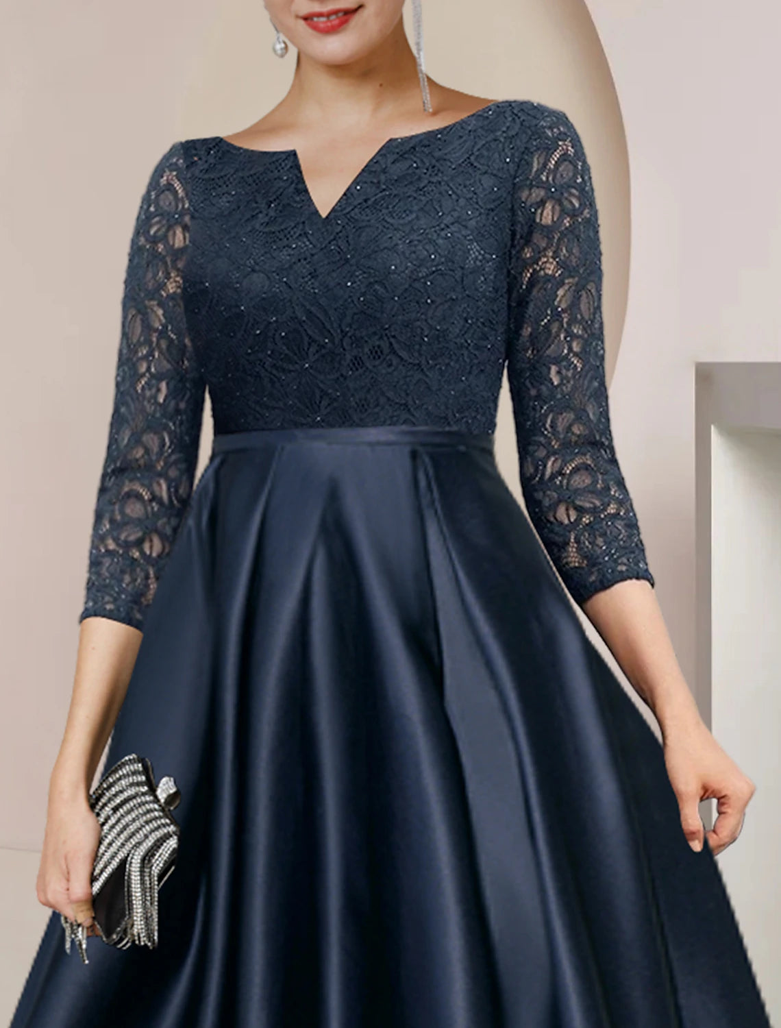 Back view of the Weitese Mother of the Bride Dress, showcasing lace details and elegant silhouette.
