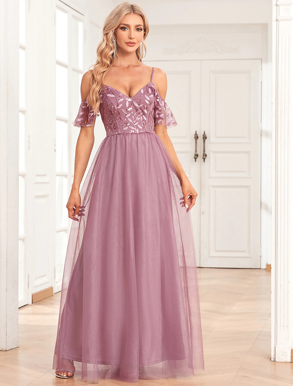 Elegant A-line evening gown with sequin embroidery.
