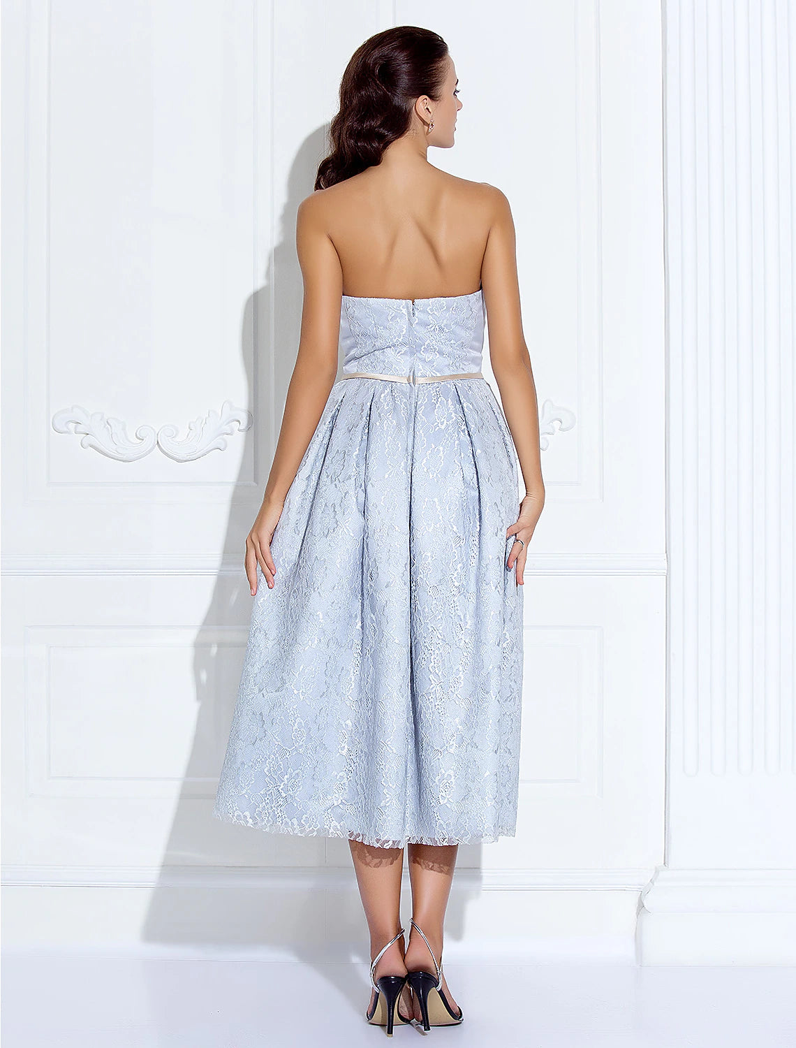 Back view of the Weitese A-Line strapless tea length dress with sash detail.