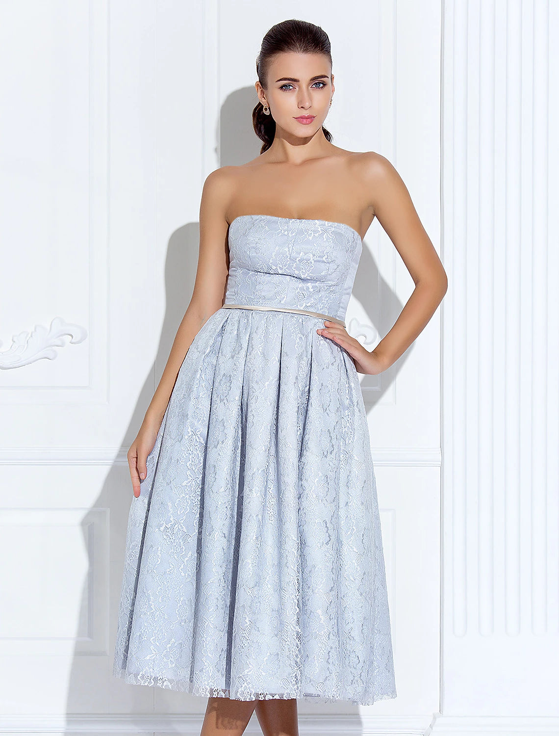 Side view of the elegant Weitese strapless lace and satin dress.
