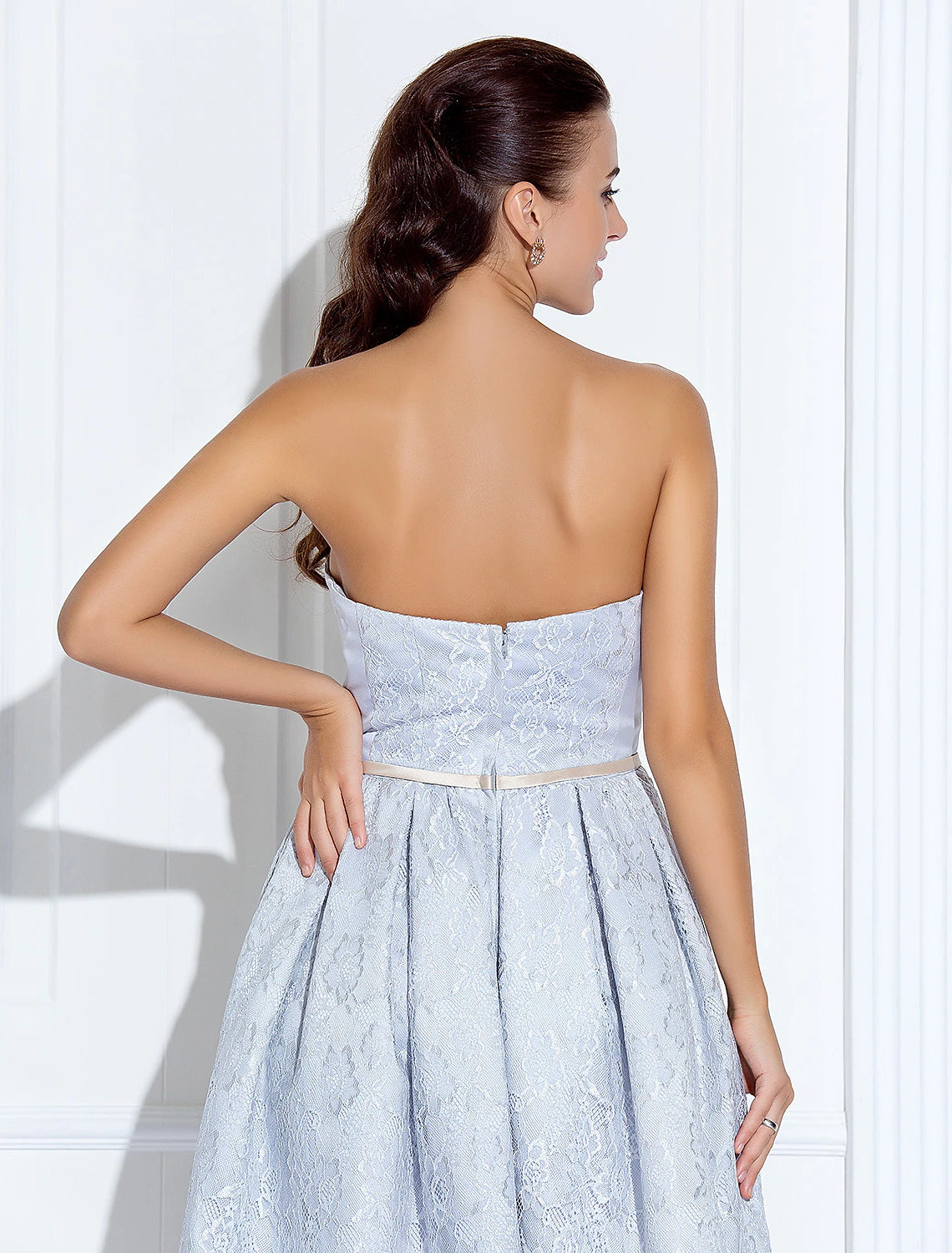 Close-up of the lace and satin fabric on the Weitese tea length dress.