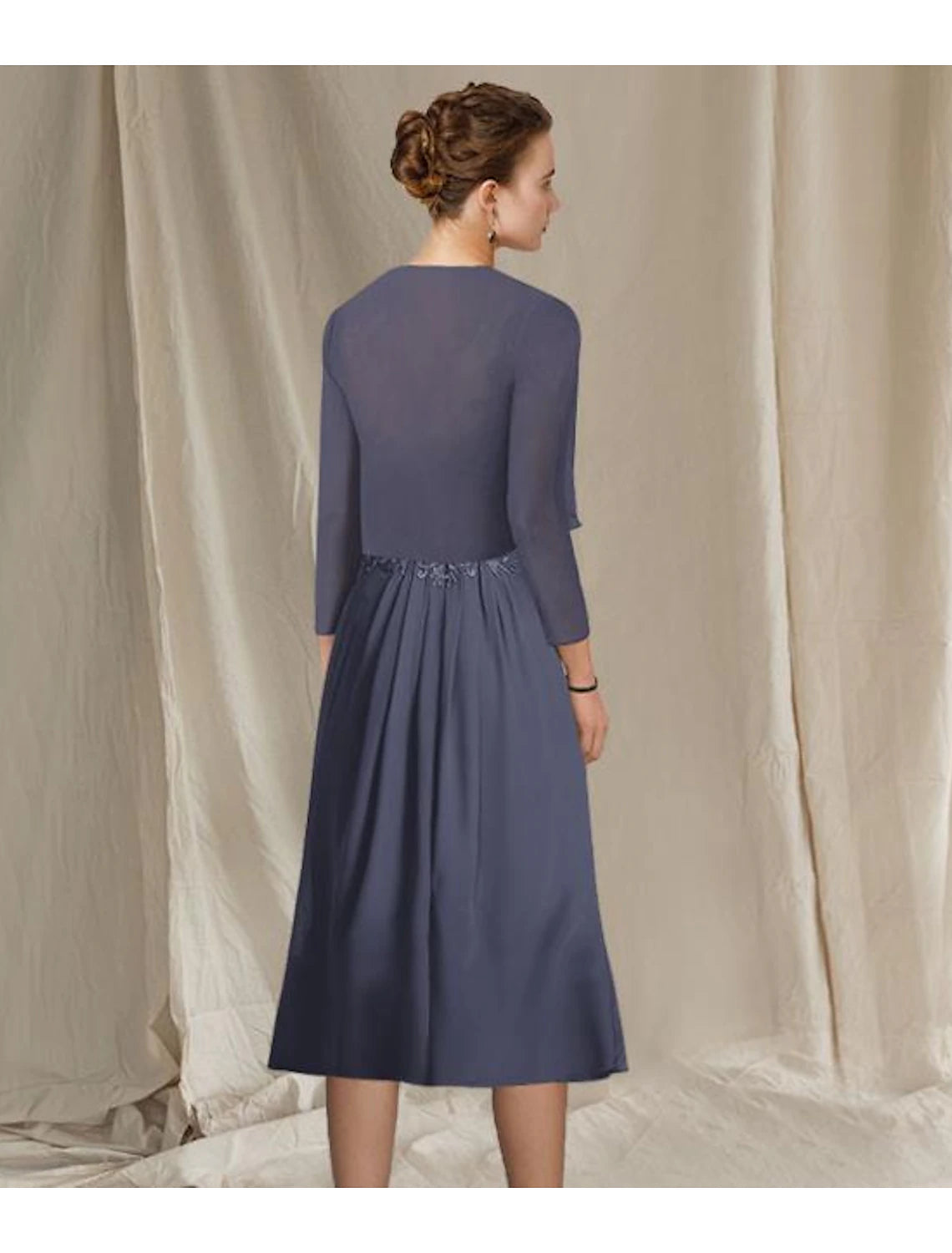 Side view of the Weitese chiffon and lace Mother of the Bride dress.