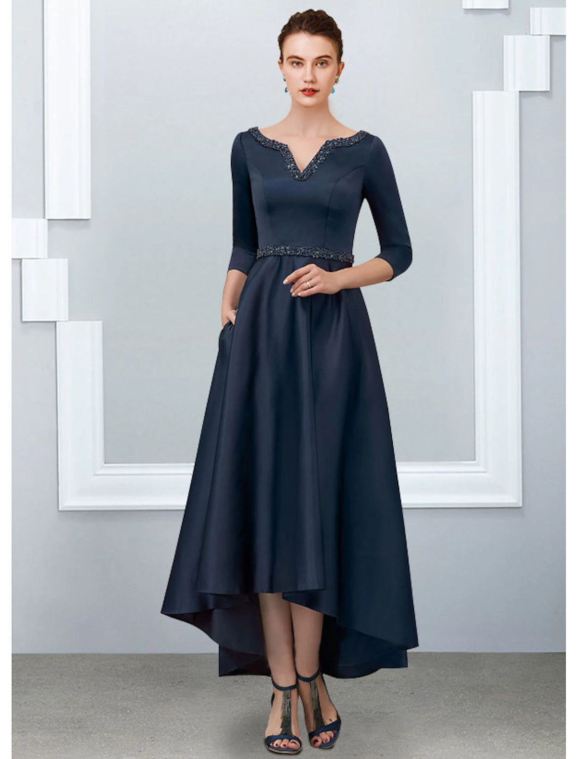 Back view of the Weitese A-Line V-neck half-sleeve satin pleated high-low dress, showing pleats.