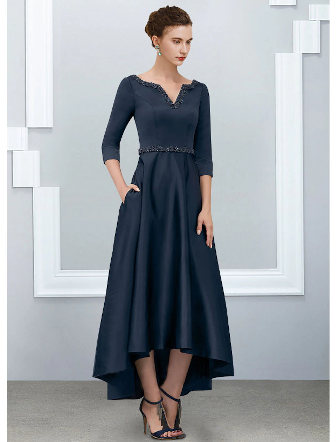 Close-up of the satin fabric and pleats on the Weitese A-Line dress.