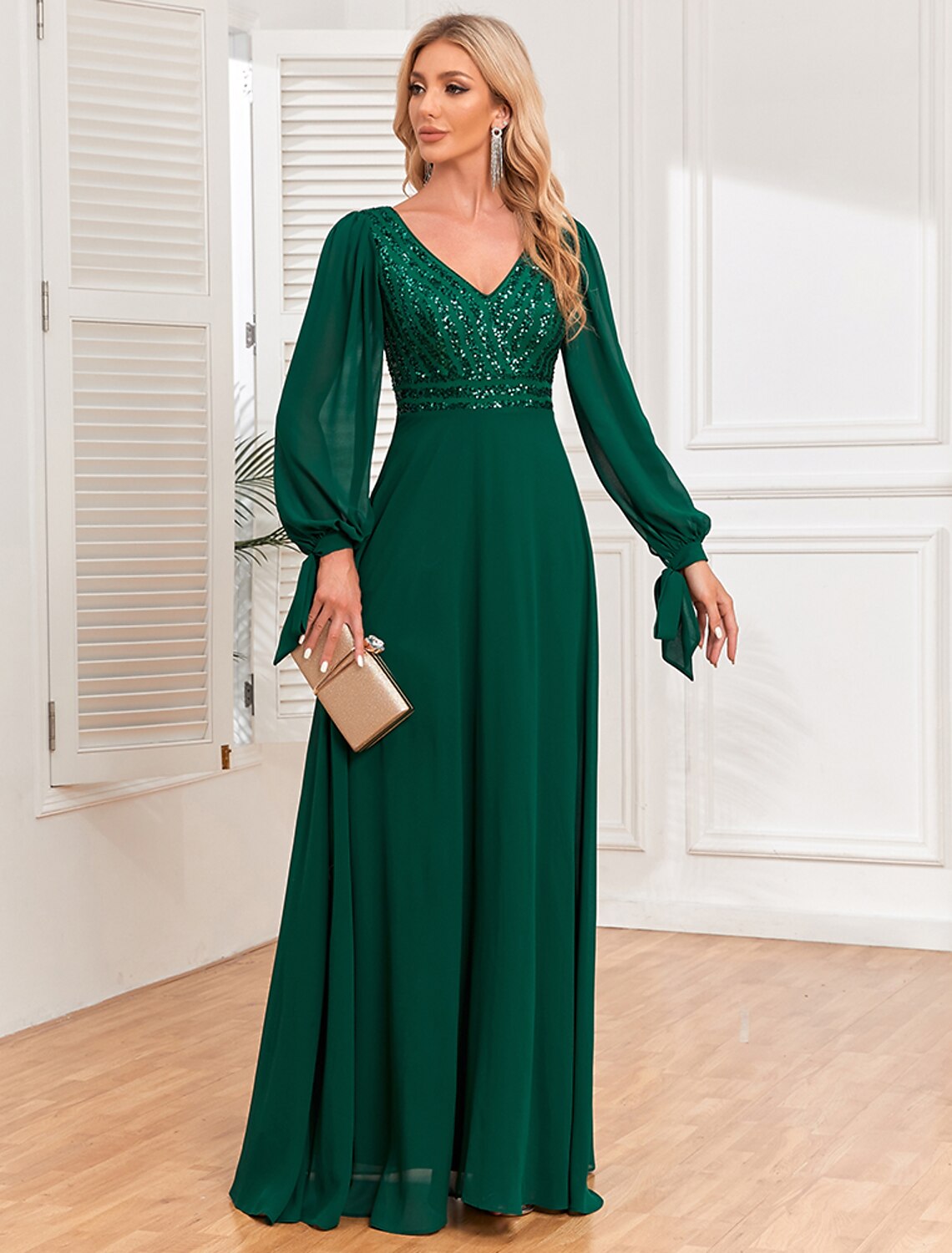 Full-length view of the Weitese A-line V-neck long sleeve sequin chiffon evening gown.