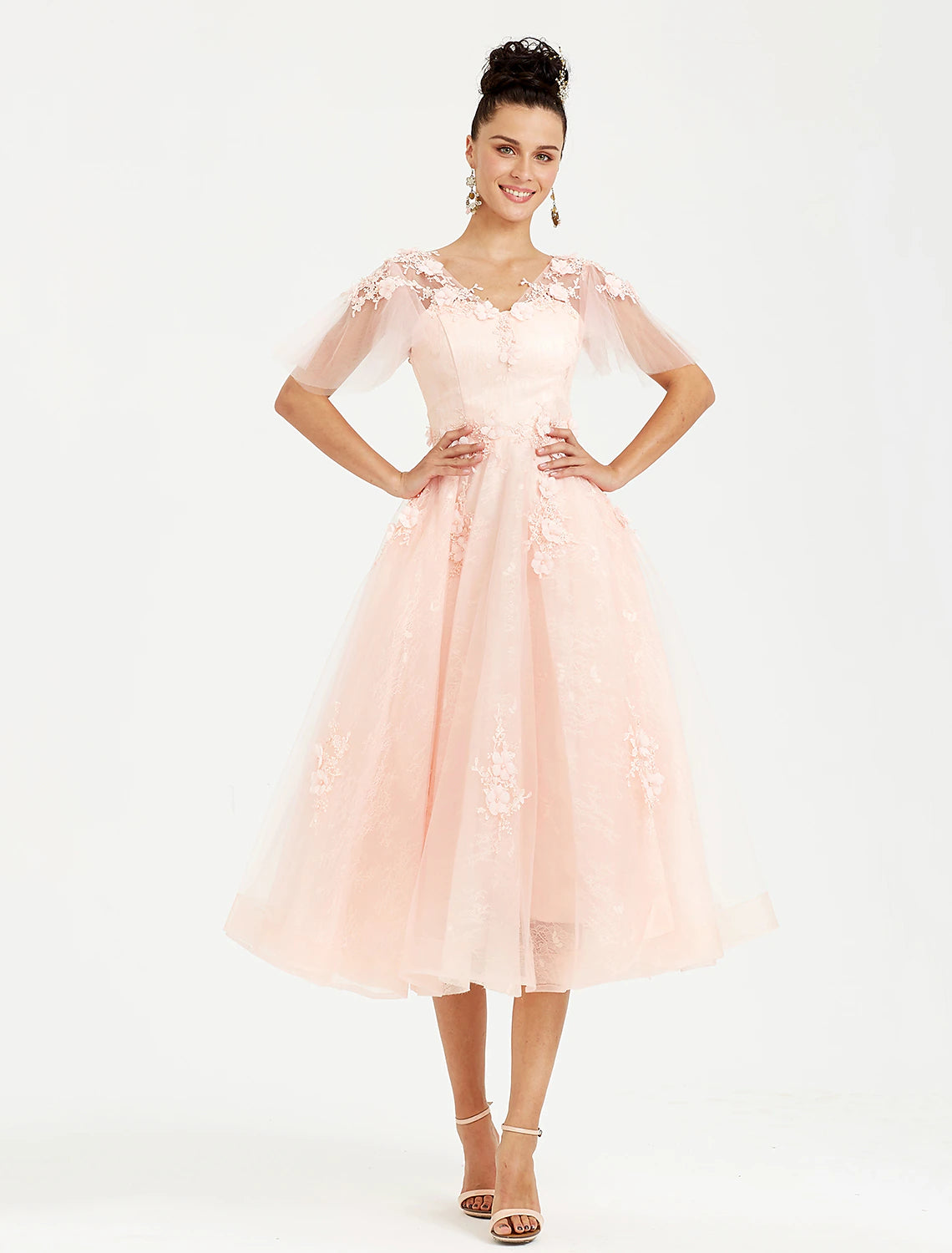 Model wearing a Weitese A-line tea length dress with V-neck and appliques.