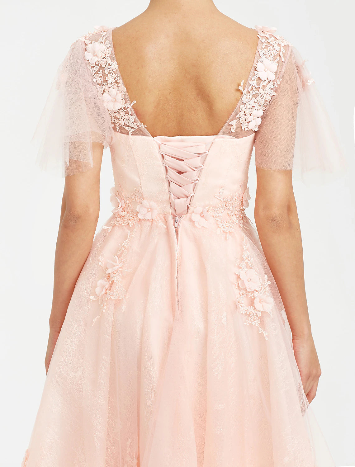 Close-up of the V-neck and applique details on the Weitese dress.