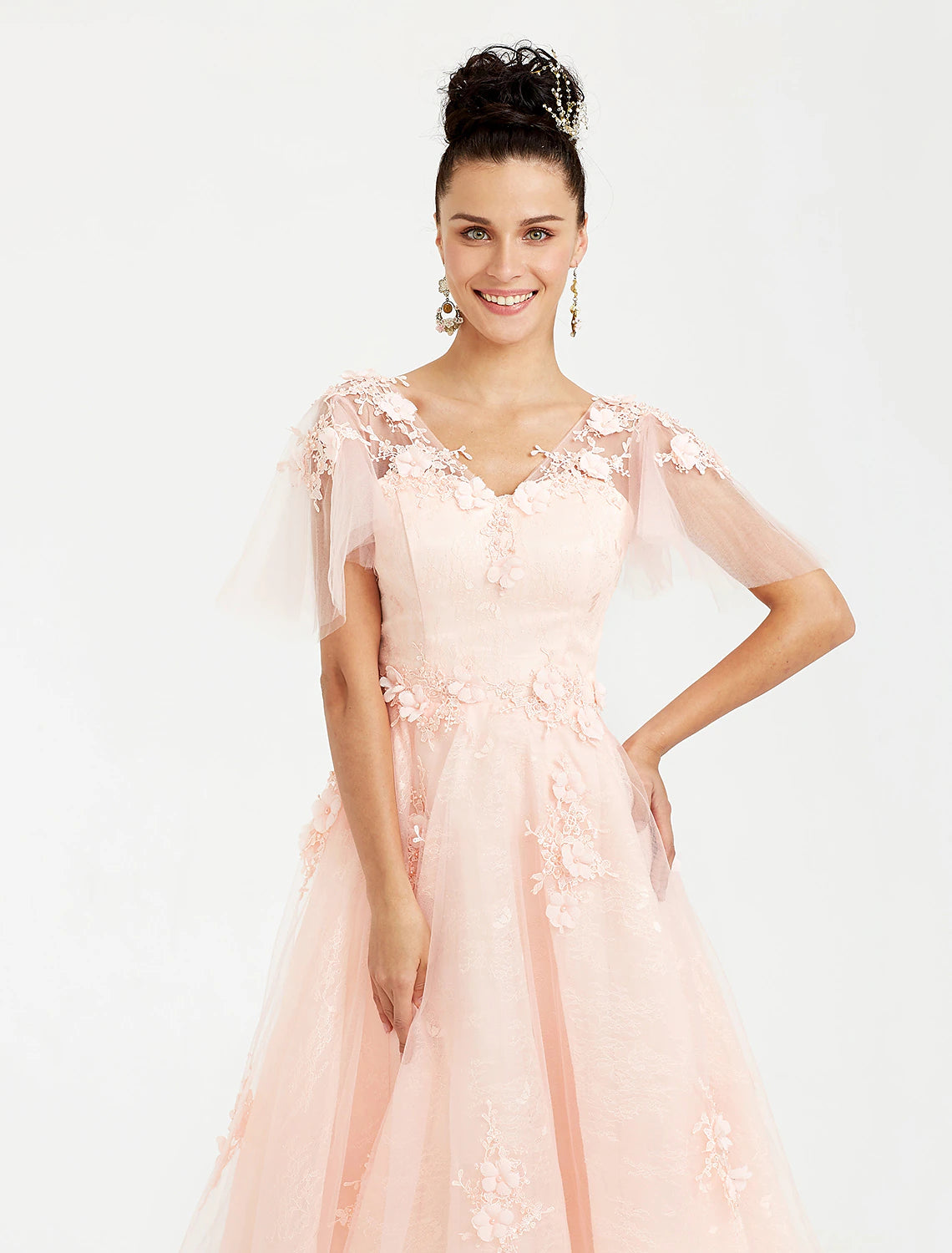Model posing in a light blue Weitese tea length cocktail dress.
