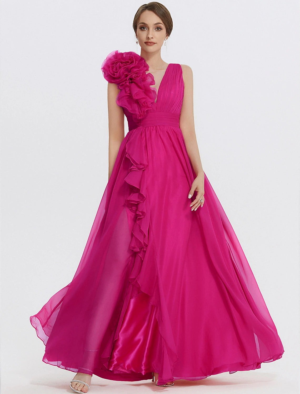 Close-up of the floral pattern and ruched appliques on the Weitese chiffon gown.