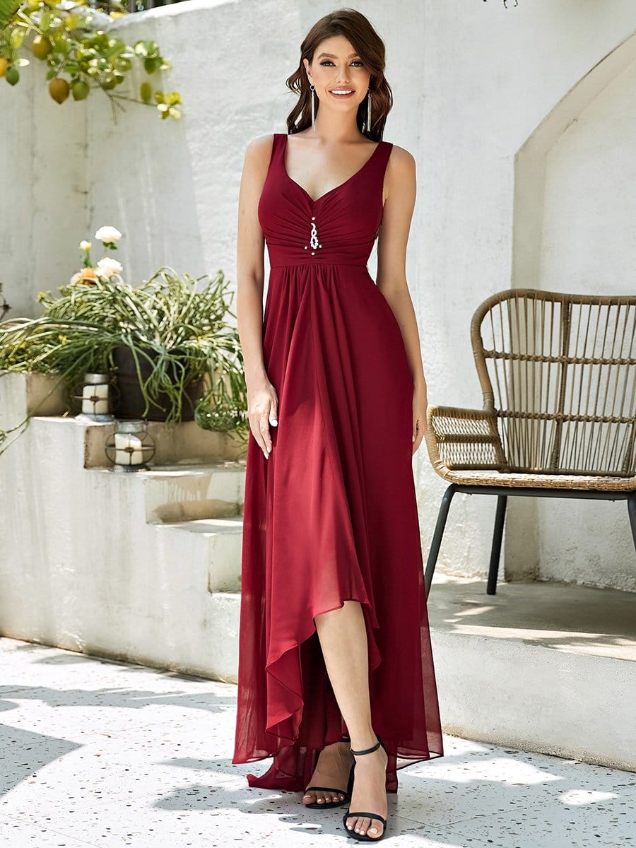 Model wearing a red Weitese V-neck high-low chiffon evening dress, front view.