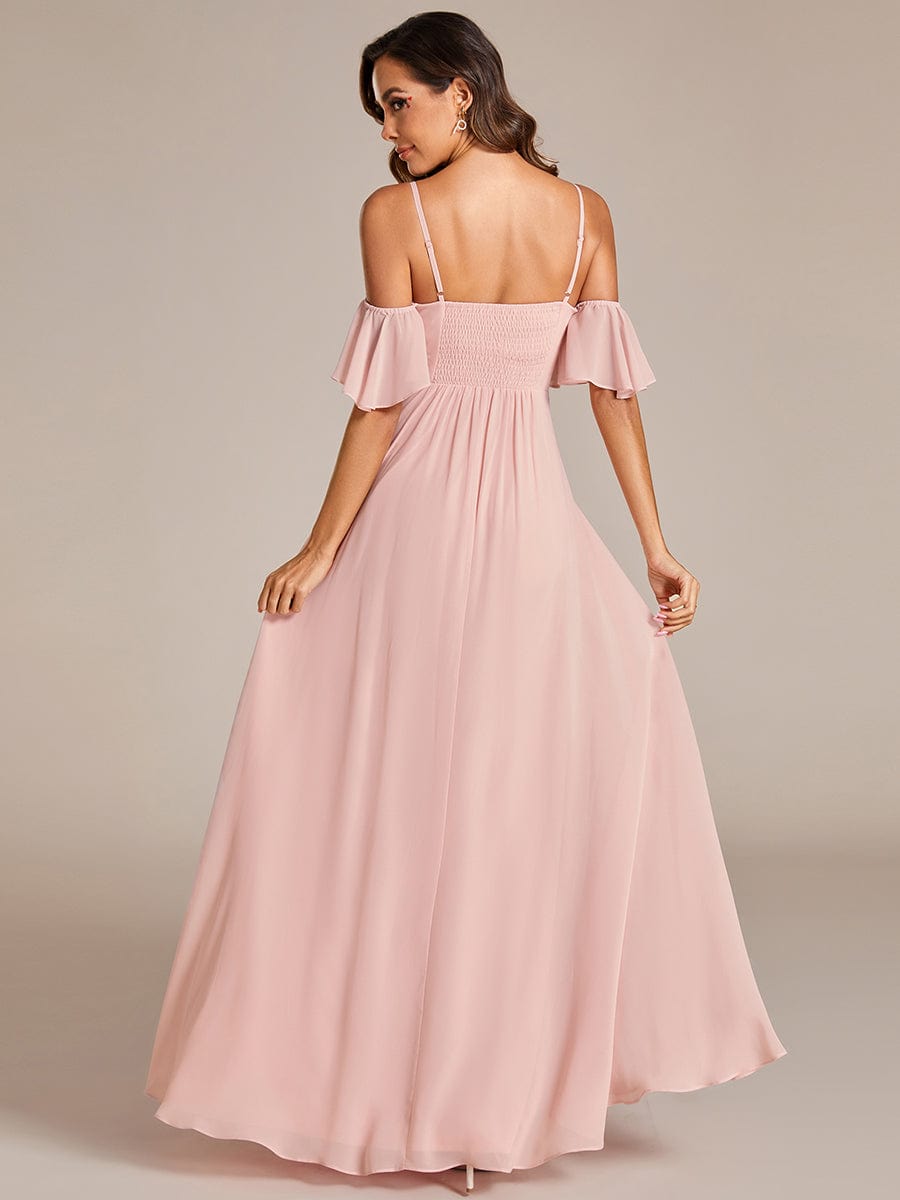 Back view of a model wearing a pink Weitese A-line chiffon bridesmaid dress.