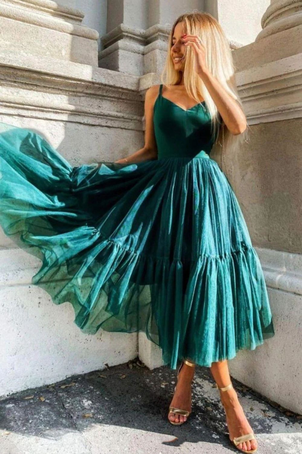 Model wearing a blue Weitese A-line V-neck spaghetti strap homecoming dress.
