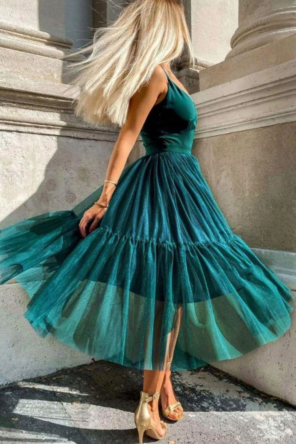 Back view of a blue Weitese A-line V-neck spaghetti strap party dress.
