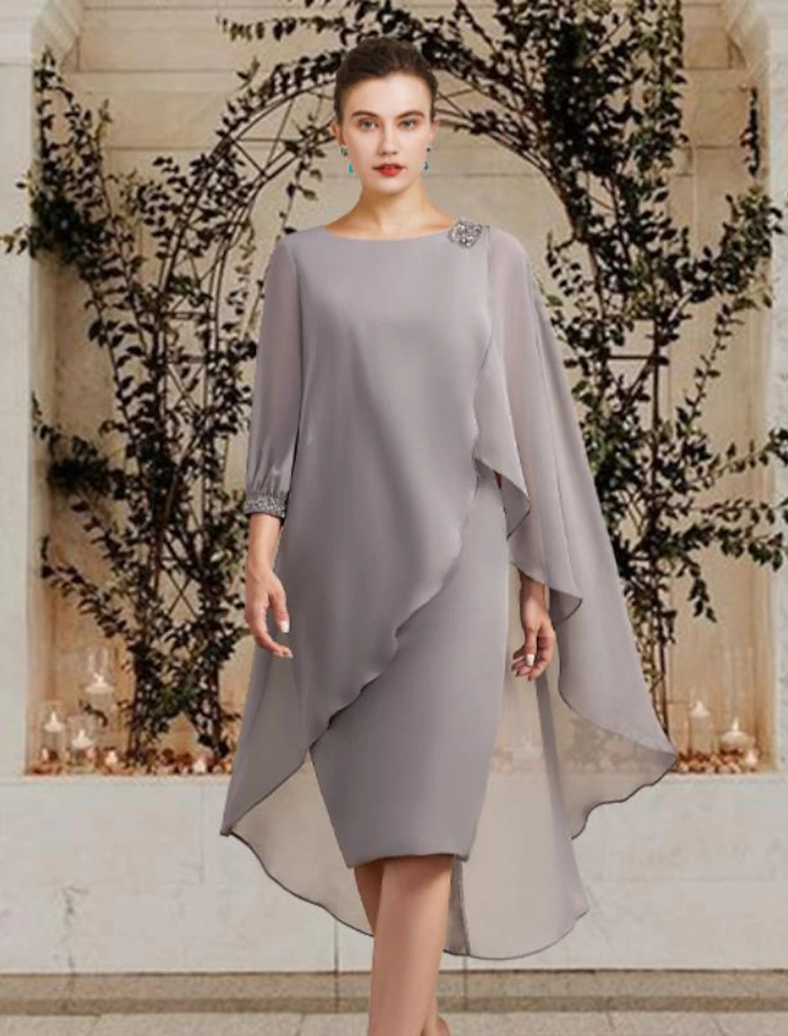Woman wearing a Weitese elegant chiffon sheath dress with jewel neck and 3/4 sleeves, featuring beading and sequins.