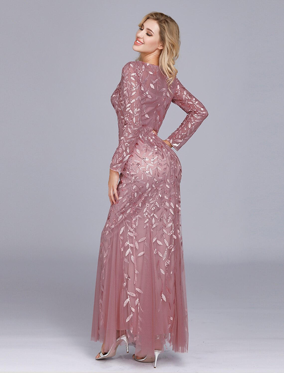 Side view of the Weitese elegant mermaid gown, highlighting the long sleeves and silhouette.