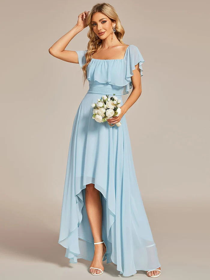 Close-up of the off-shoulder neckline and bodice of the chiffon bridesmaid dress.
