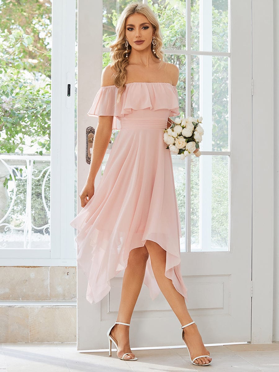 Back view of the model in the elegant chiffon off-shoulder dress.