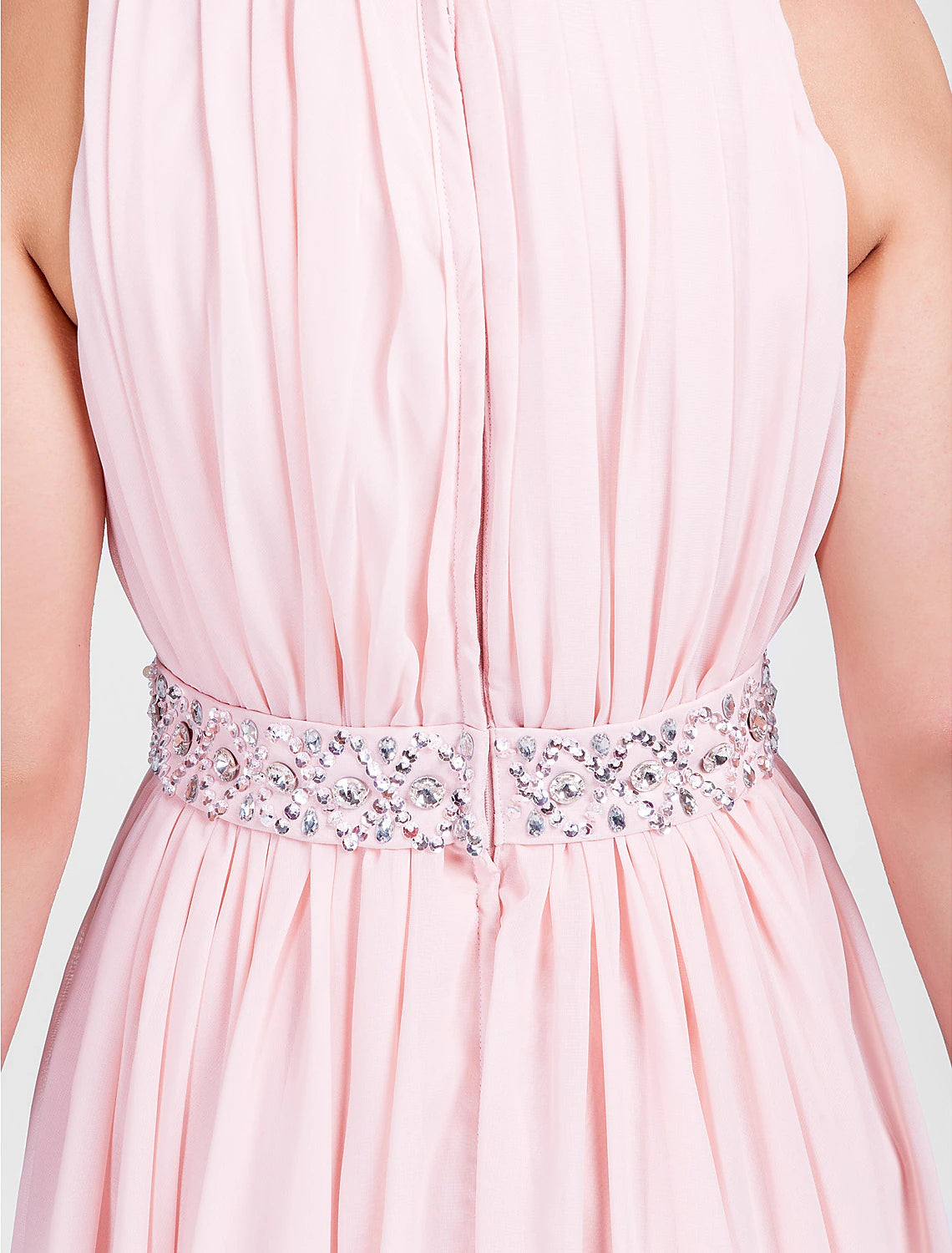 Another view of the model in the jewel neck sleeveless knee-length chiffon dress, emphasizing the overall silhouette.