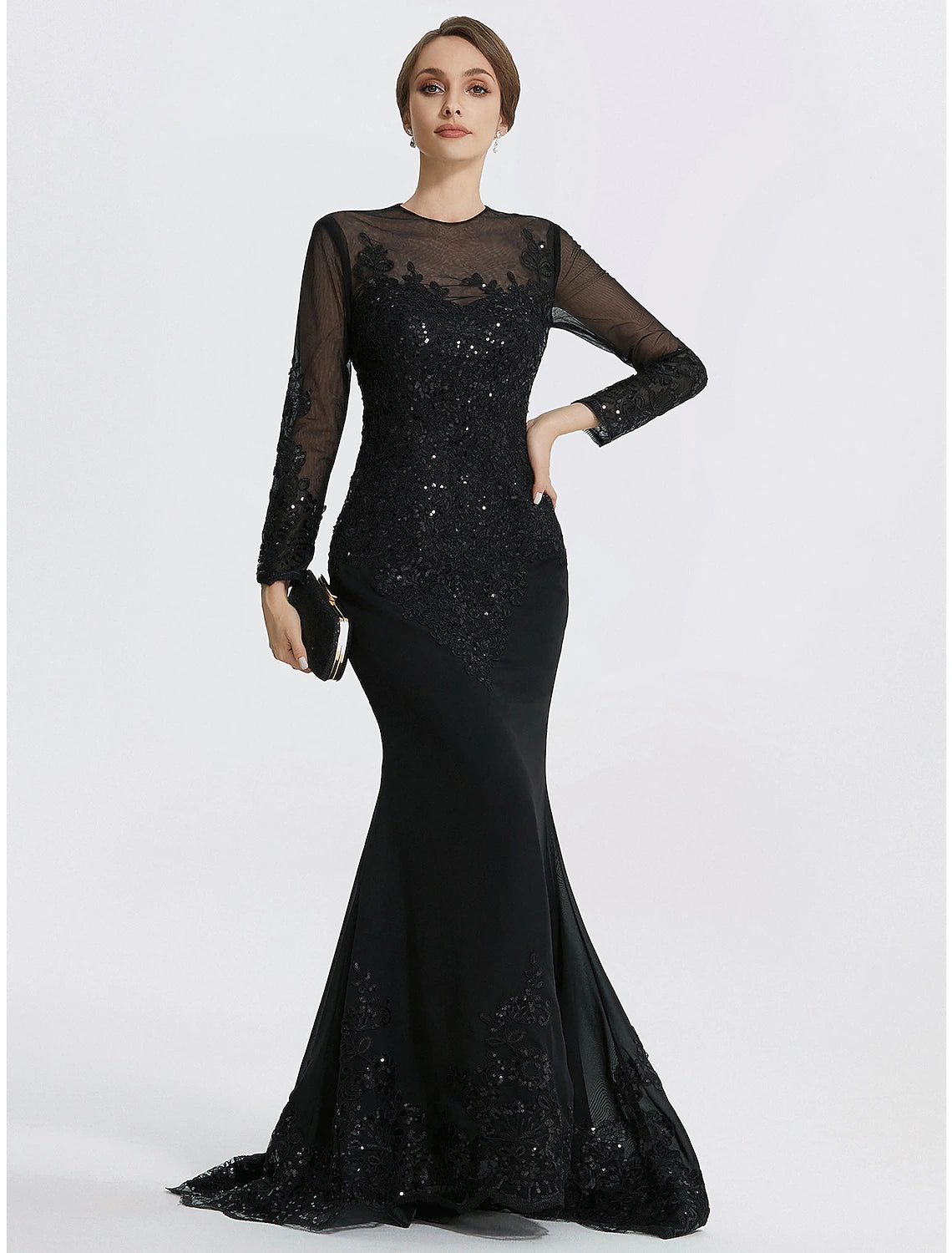 Woman wearing a Weitese elegant long sleeve jewel neck mermaid evening gown with lace appliques.