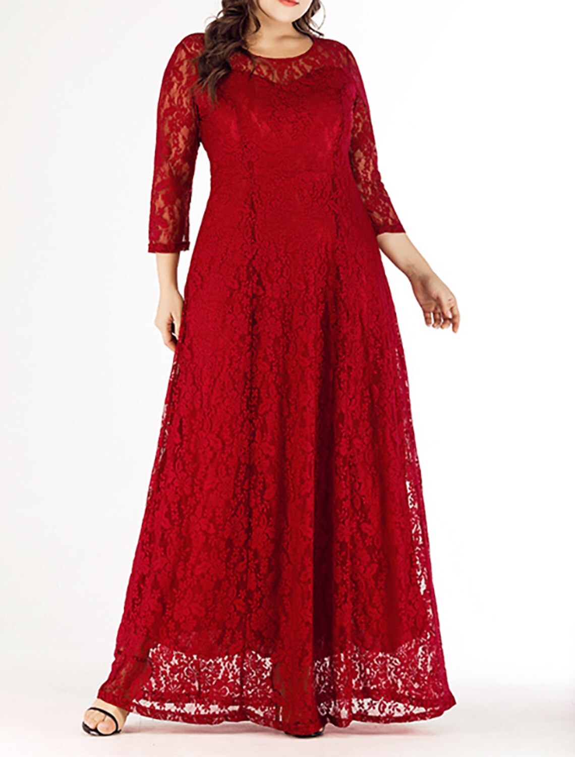 Woman wearing a Weitese plus size curve lace maxi dress with 3/4 sleeves and crew neck.
