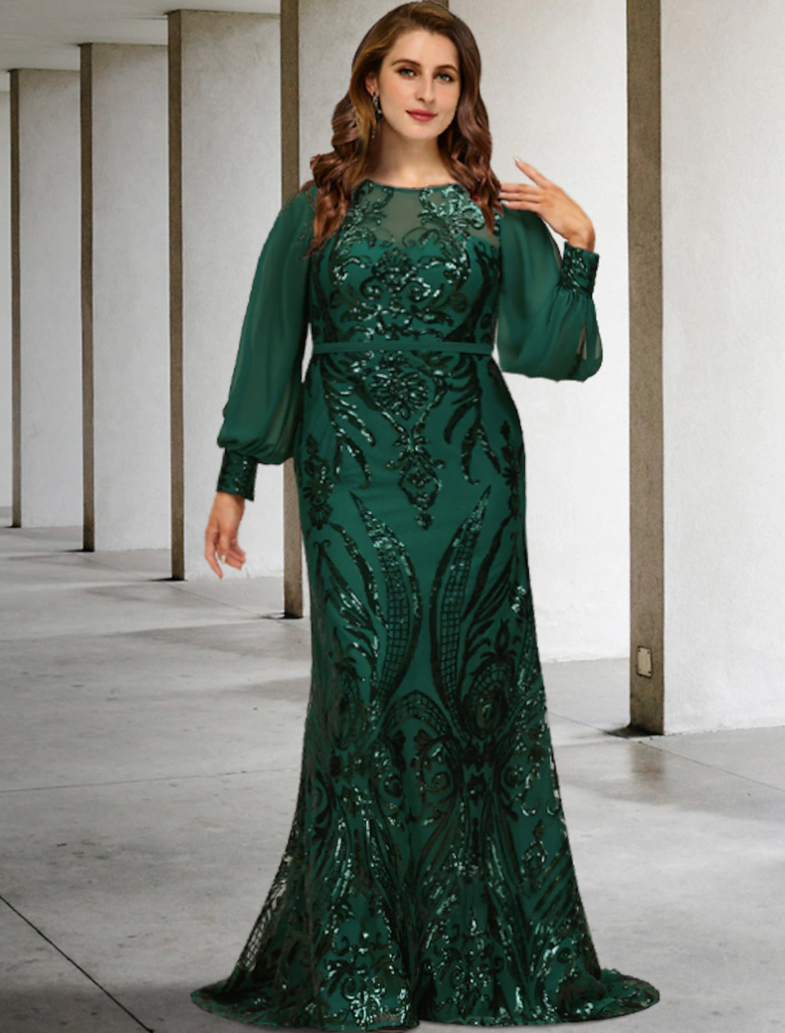 Elegant plus size woman wearing a long sleeve jewel neck mermaid mother of the bride dress with sequin chiffon.