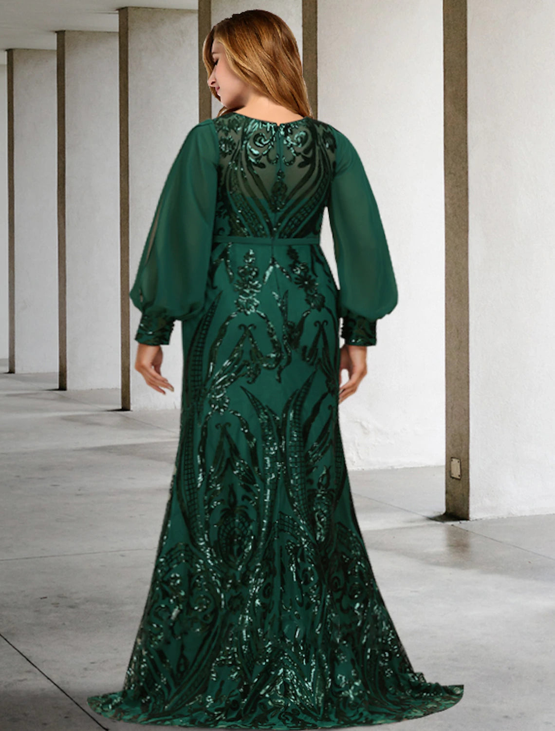 Full length view of the elegant plus size mermaid mother of the bride dress with a sweep train.