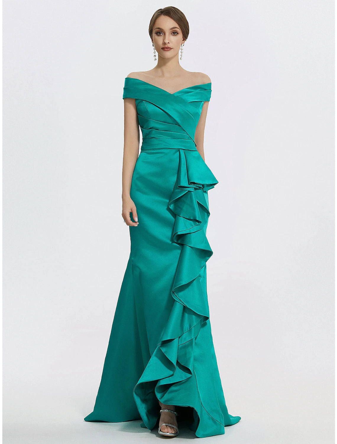 Woman in elegant off-shoulder satin ruffled evening gown.
