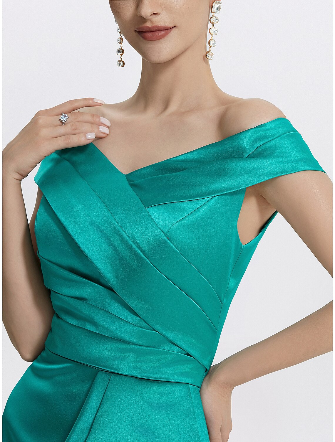 Side profile of woman showcasing the sheath column silhouette.