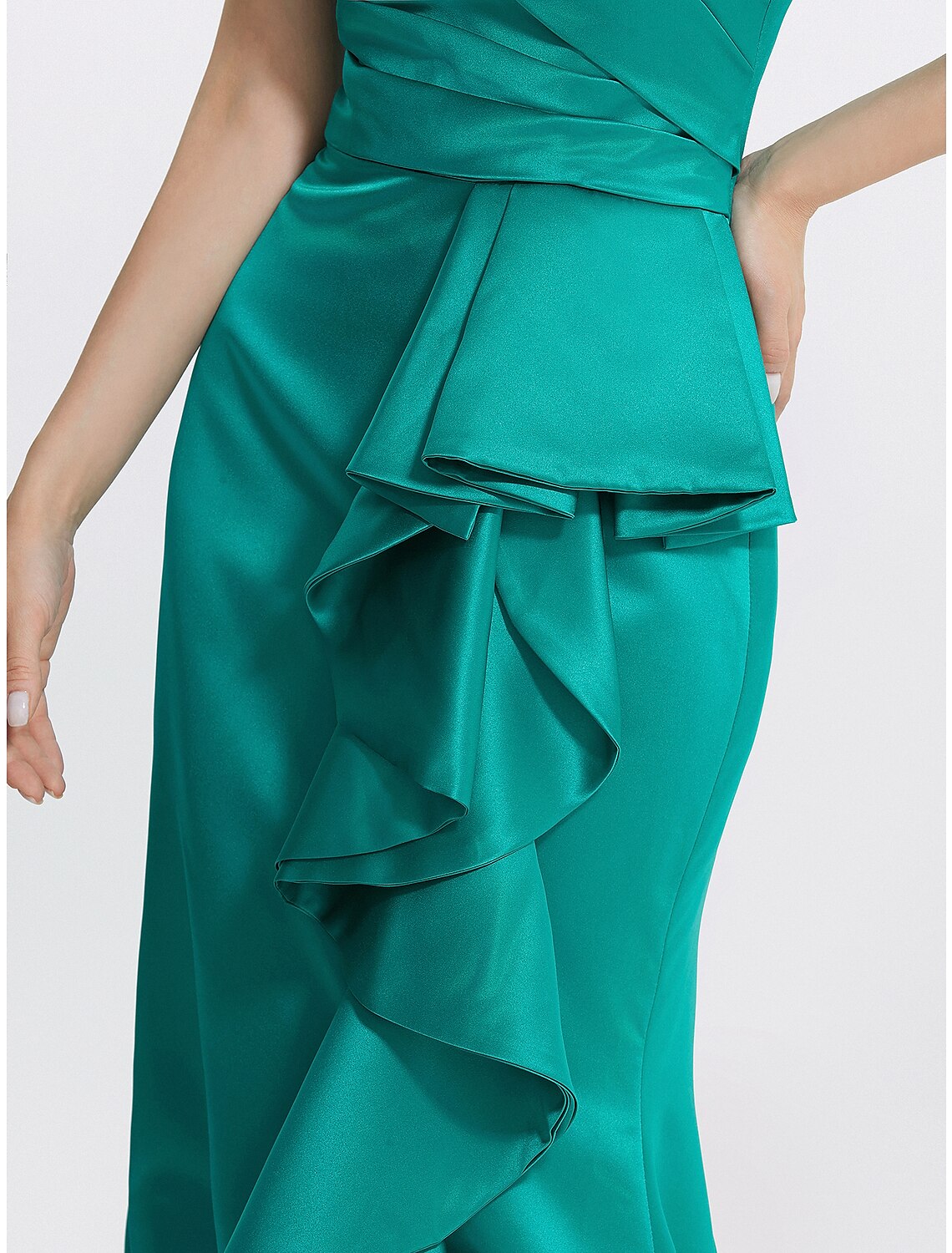 Close-up of the off-shoulder neckline and ruffle detail.
