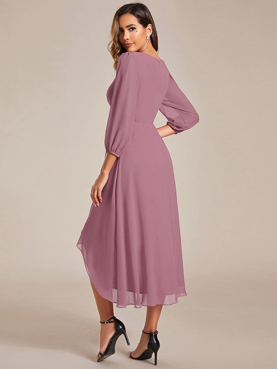 Side view of model in an olive green Weitese A-line chiffon dress.