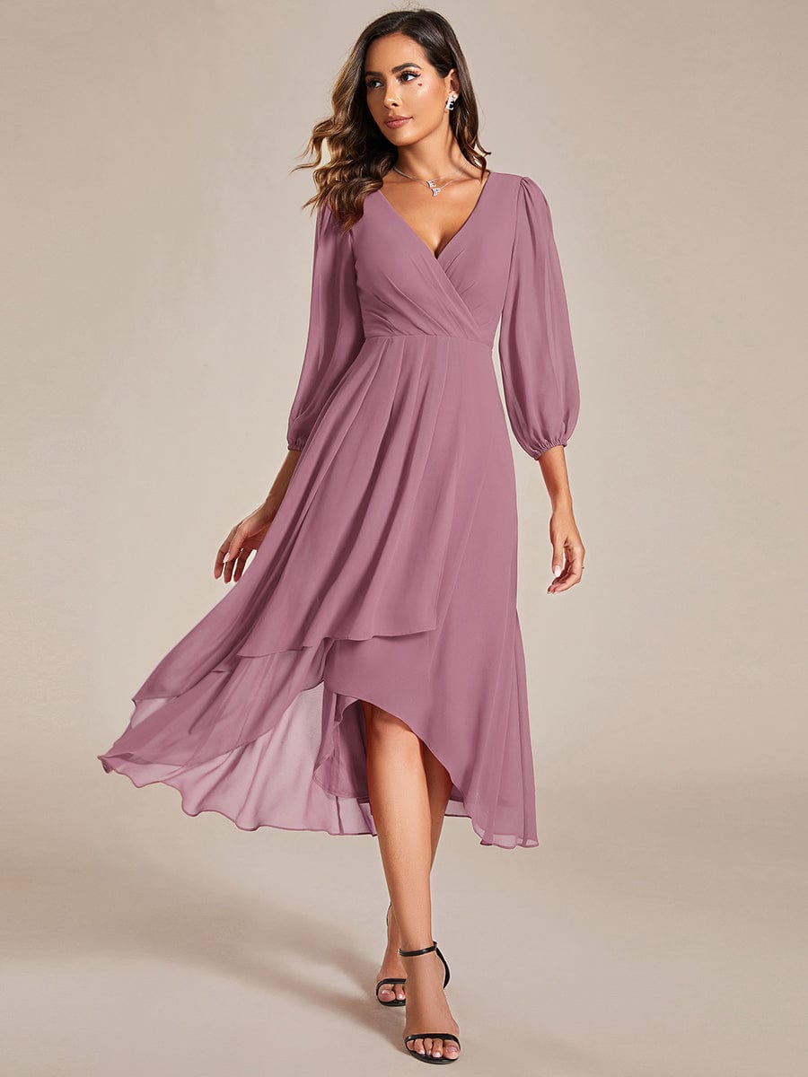 Full length view of model wearing an olive green Weitese A-line chiffon dress.