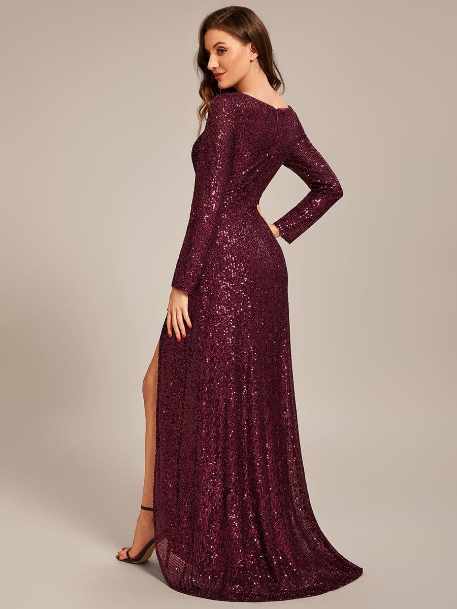 Red sequin long sleeve V-neck evening dress with asymmetrical hem.
