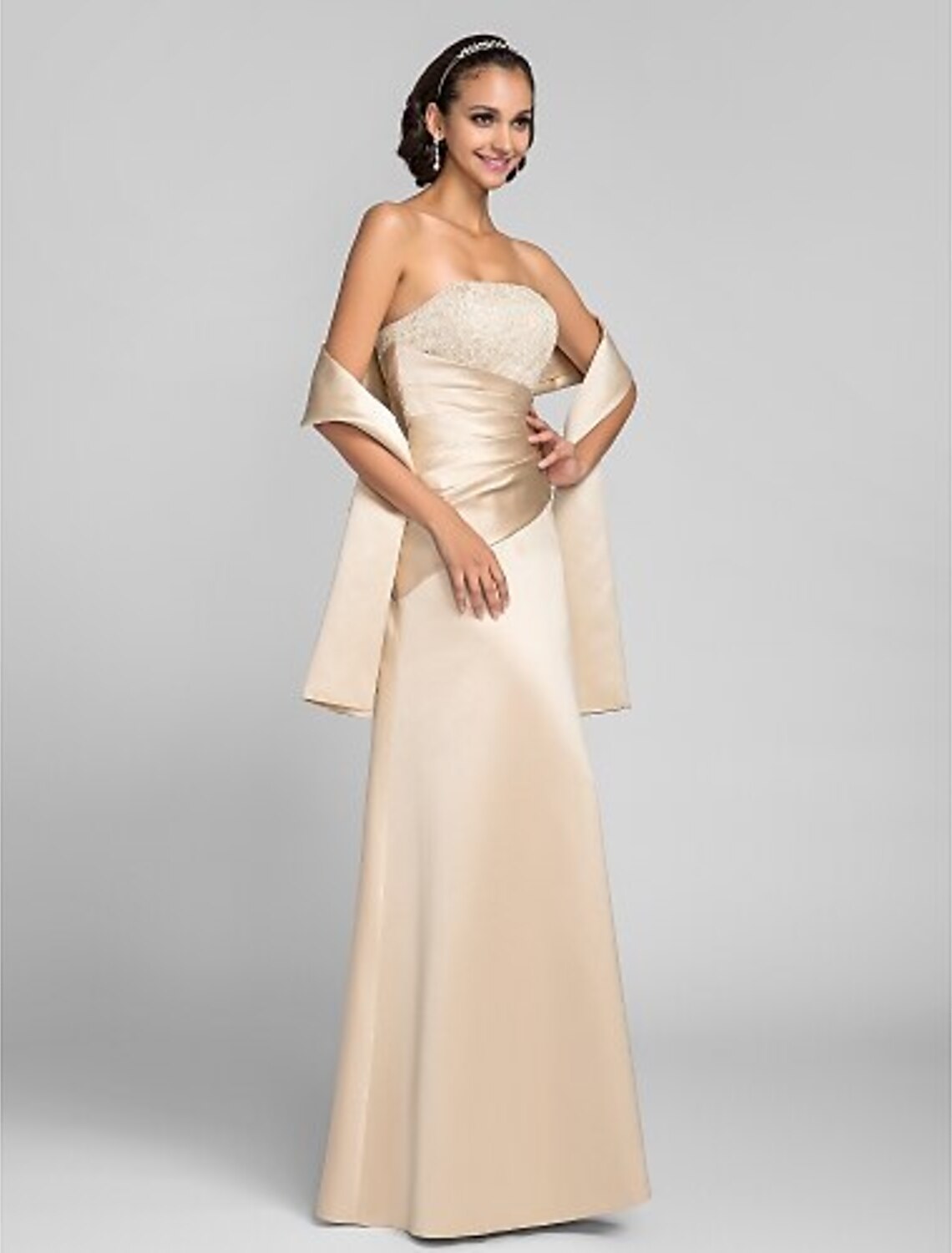 Front view of the Weitese elegant sheath strapless evening gown with lace beading and side draping.