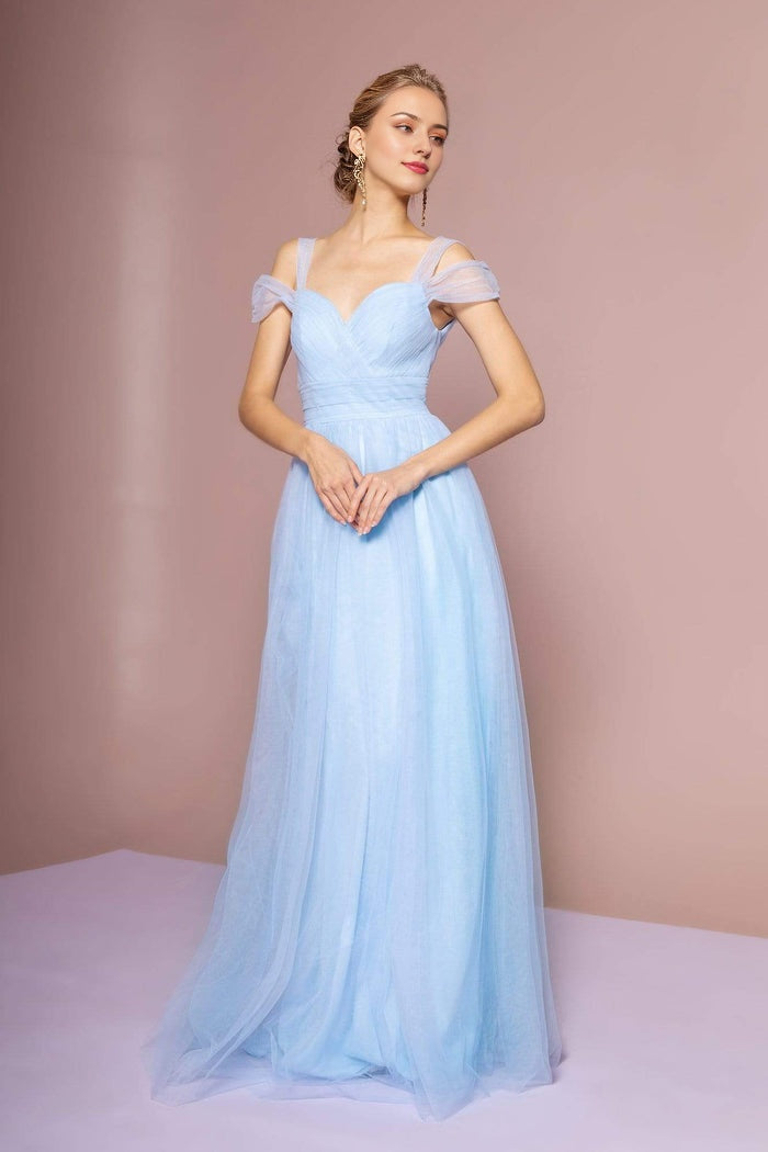 Woman wearing a Weitese A-line tulle gown in light blue with a sweetheart neckline and shoulder straps.