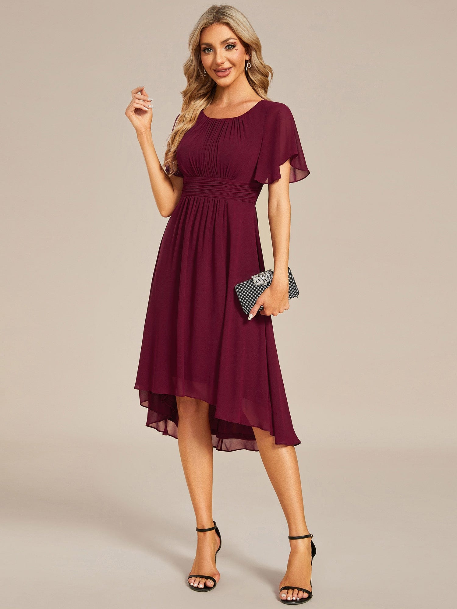 Model wearing a red Weitese flowy chiffon A-line knee-length dress with a round neckline.